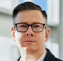 Alexander Hughes, CEO i członek kierownictwa firmy crypto trading, portret
